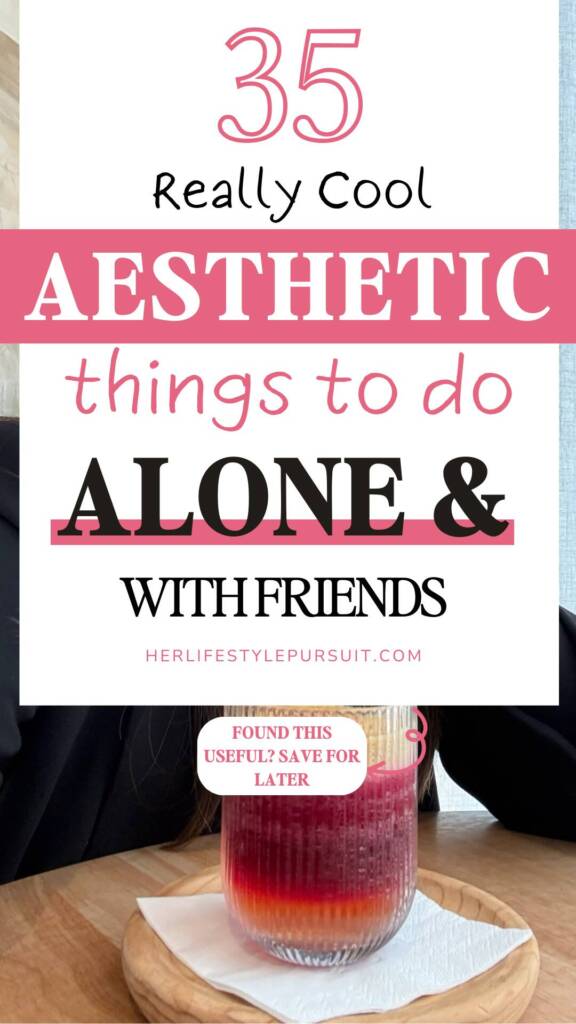 A Pinterest pin with a pink and black typography design promoting '35 Really Cool Aesthetic Things to Do Alone & With Friends' from herlifestylepursuit.com. The bottom of the image shows a layered pink and red ombre drink in a textured glass on a wooden coaster. A 'Found this useful? Save for later' banner appears at the bottom.