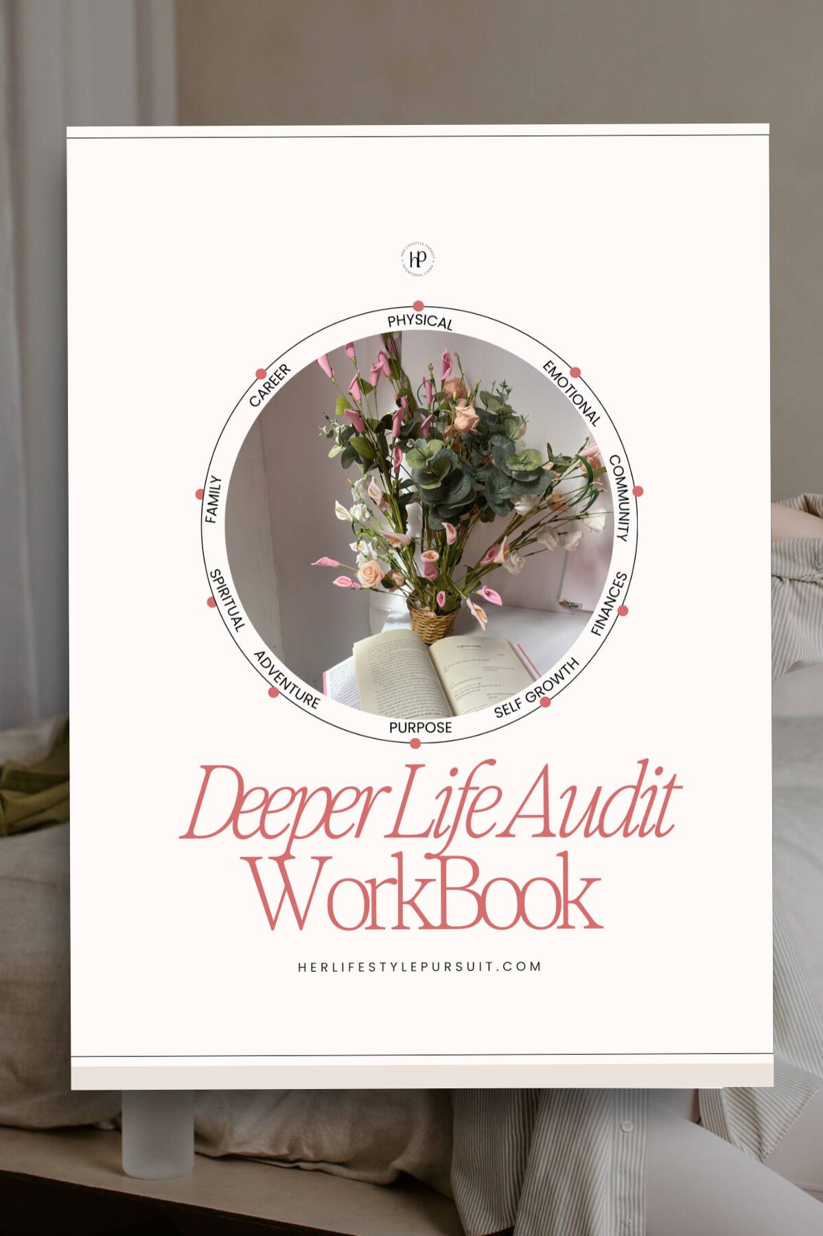 Deeper Life Audit Workbook cover in blush pink, with a bouquet of flowers and an open book inside a circle of life area labels, from Physical to Career.